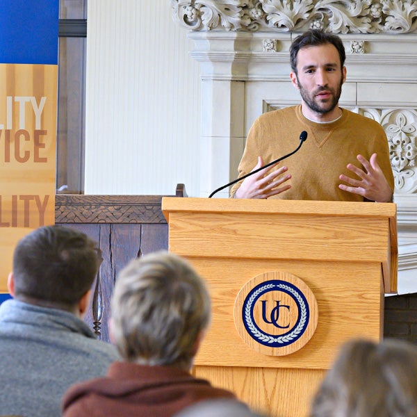 Male speaking at podium