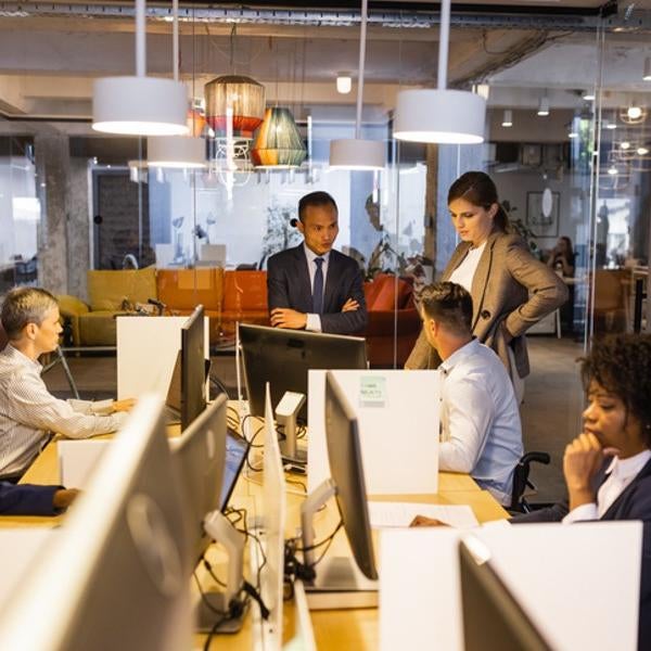 people working in conference room