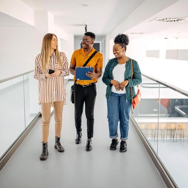 students in hall of office