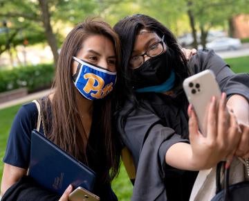 two women at graduation