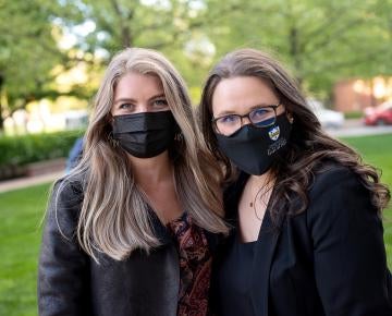two women at graduation