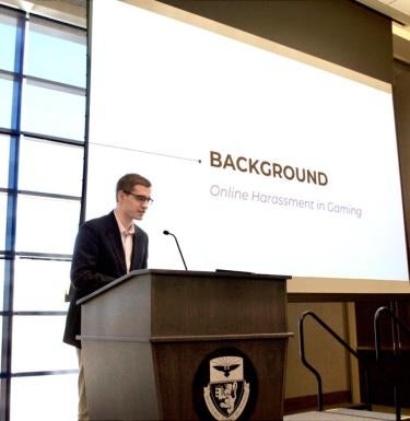 MPA student Myles Cramer presents at the Hacking4Humanity event 