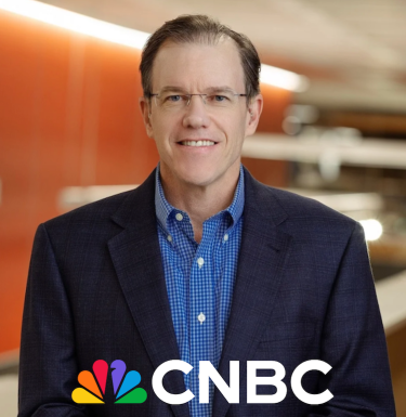 Headshot of Michael Kenney with CNBC logo