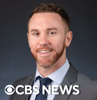 Justin Forzano headshot with CBS logo